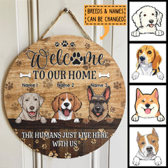 Welcome To Our Home, The Humans Just Live Here With Us, Dog Pawprints Background, Personalized Dog Lovers Door Sign